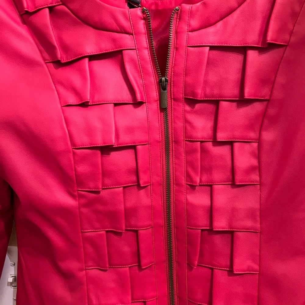 Faux Red Leather Jacket,  size Large. Tags on jacket.pleats on front.